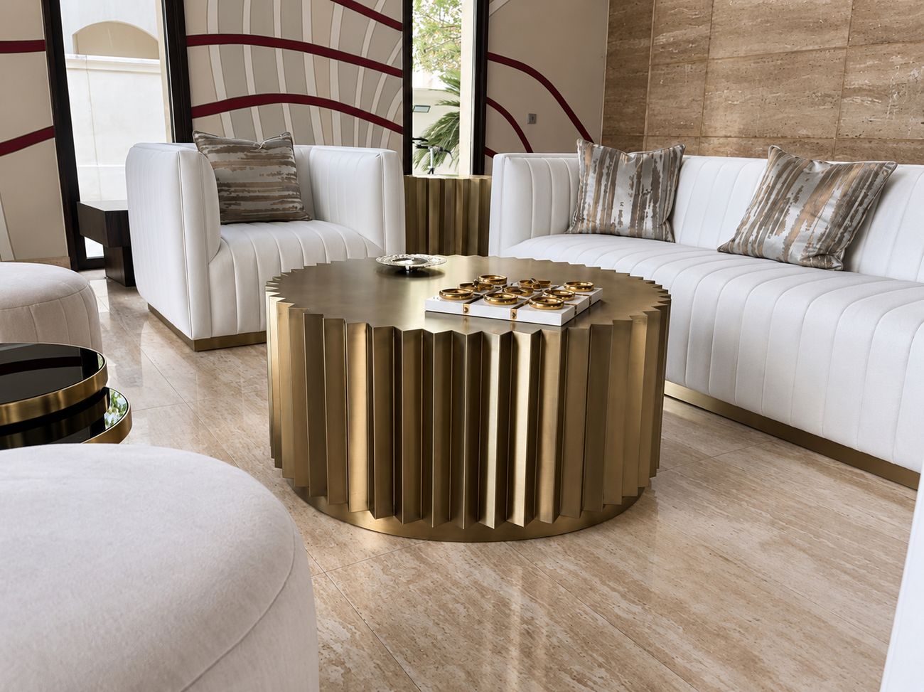 Fluted coffee table in a brass-tone finish in a living room