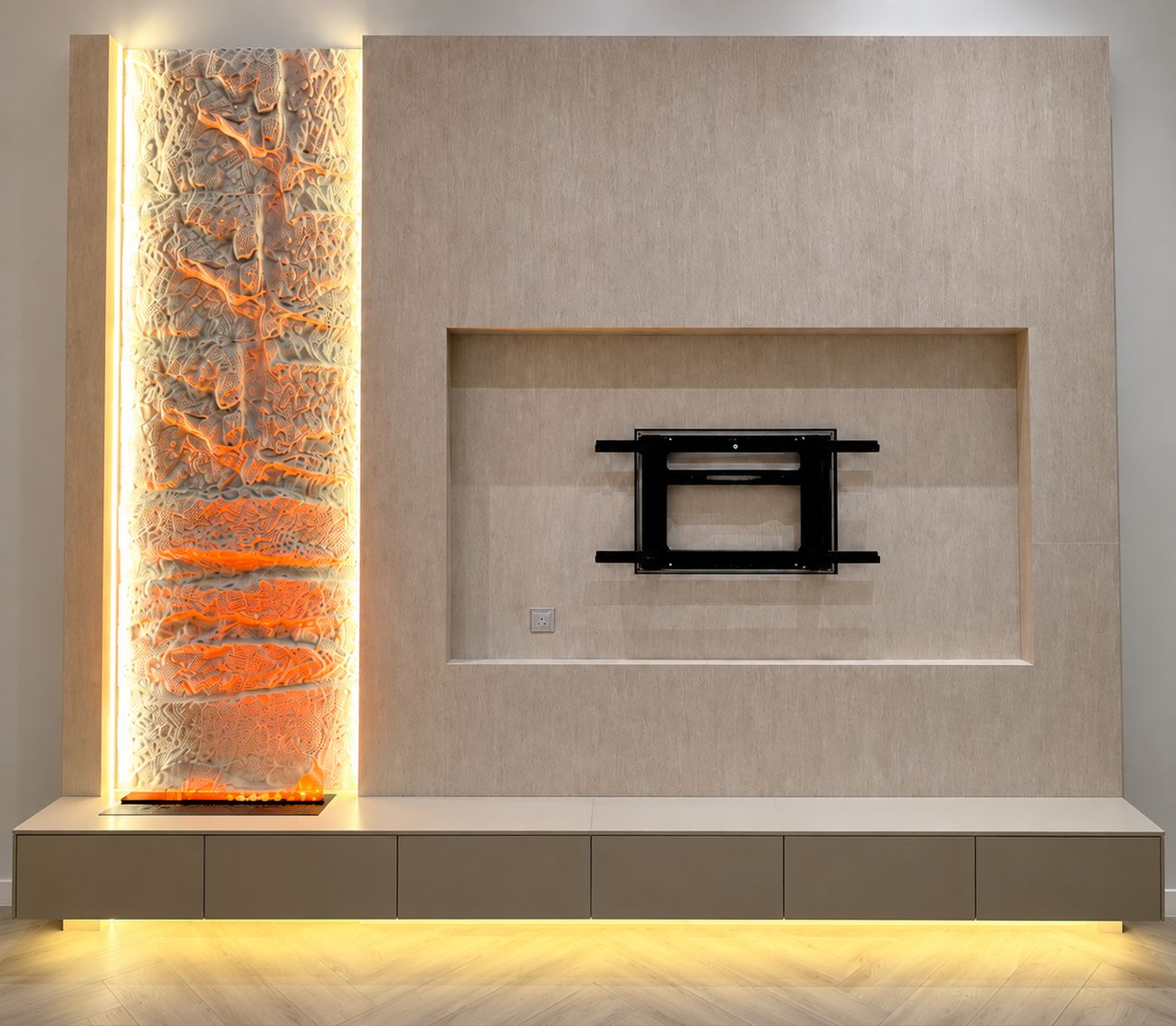 Textured feature wall with a backlit sculpted panel and recessed TV niche